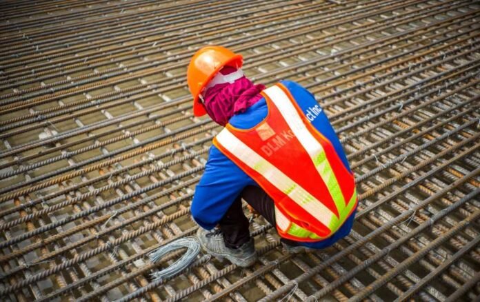 Workers participating in occupational safety and health training programme in Pakistan